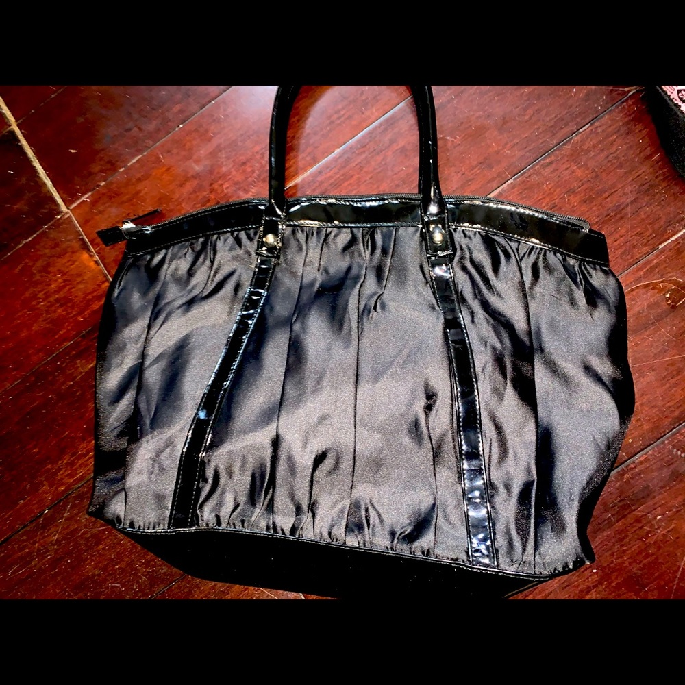 Black purse. By Rihanna